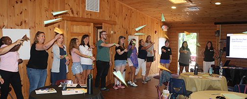 1D4D1 attendees learned valuable lessons from simple exercises.  One task was to draw an animal in 7 seconds after announced by the group leader.  Another was to concentrate on listening skills after watching a paper airplane instructional video.
