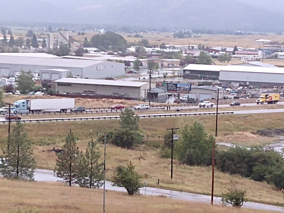 DZumpfe's tweet photo. Presumably attributed to the recent torrential rain... vehicle in the ditch I-90 #MM98 #mtwx #Missoula @NWSMissoula https://t.co/bu7hGntKfF