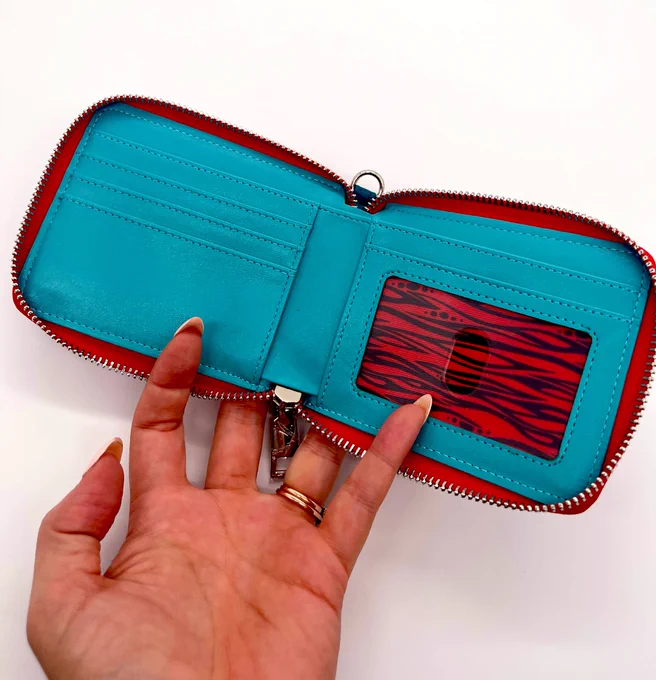 Want some Tiger in your life but don't want a whole Embroidered jacket? No problemTiger Wallet is unlocked on Kickstarter!And take a look at the striped interior! 