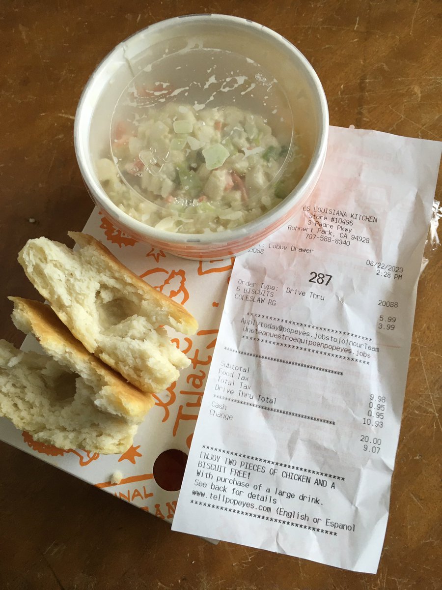 starofgrae's tweet photo. This is what I get for trying to go to #Popeyes What a complete joke, including the drive thru guy. This is what you want your product to be Popeyes? Raw biscuits and a half empty cole slaw for 10$?! No thank you and never again. @Popeyes https://t.co/Vcj3duz2kz