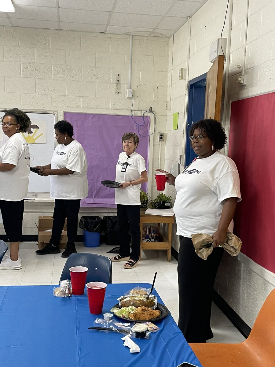 New Hope Elementary School staff eating lunch after convocation.