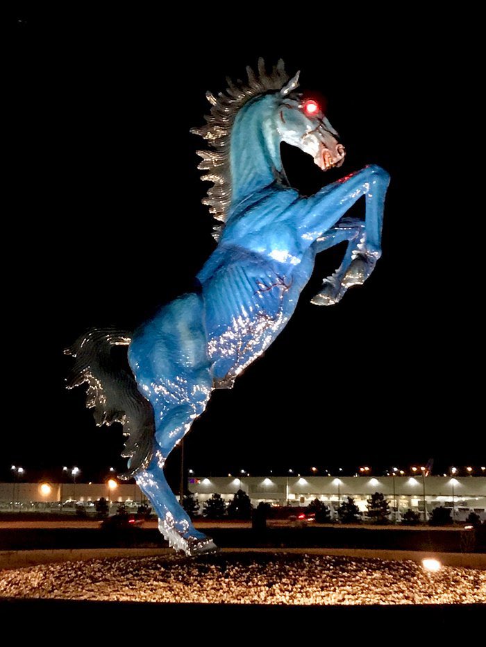 MorbidKnowledge's tweet photo. Denver International Airport's "Blue Mustang” sculpture is nicknamed "Blucifer" because of its glowing red eyes. Before its unveiling in 2006, the sculpture's artist died after a 9,000-pound piece of the Blue Mustang fell on him. https://t.co/ROM9ZONqaA
