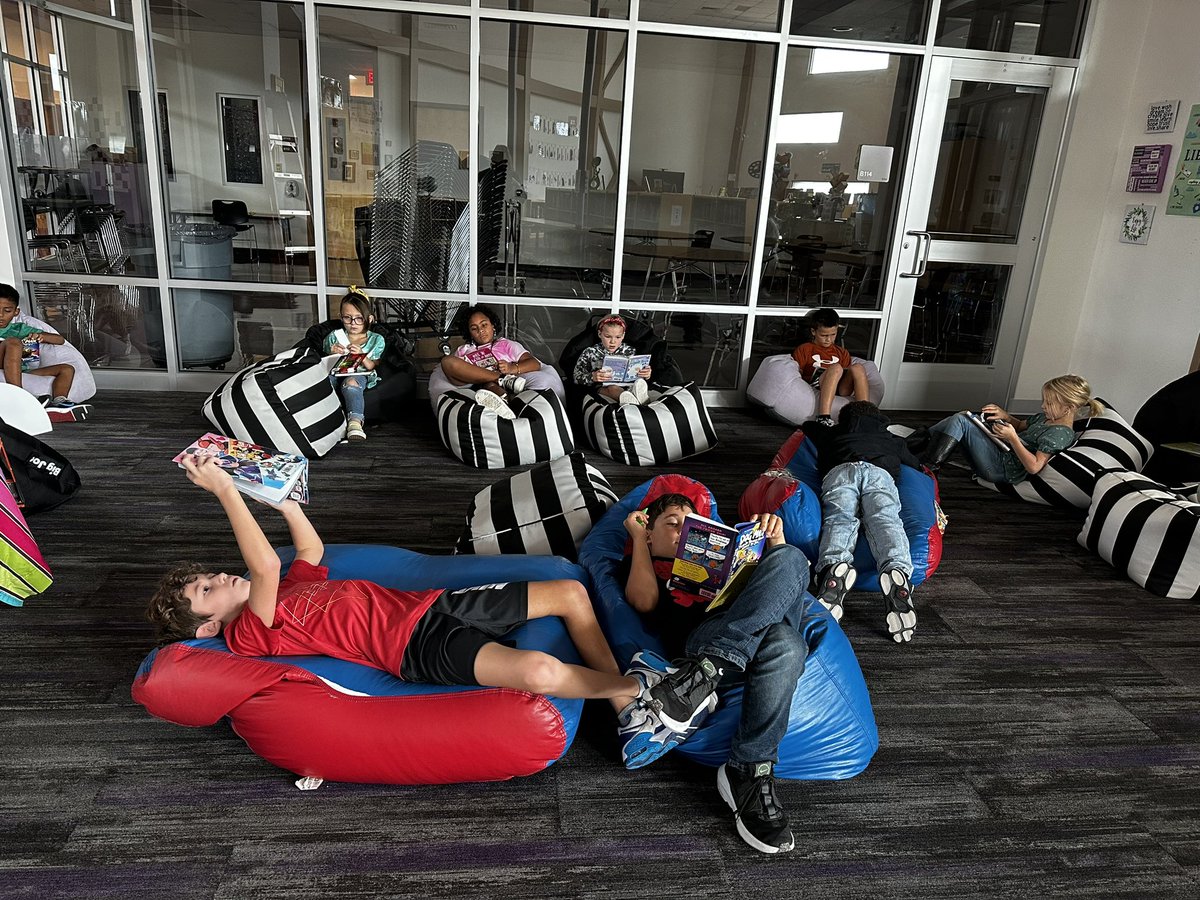 HugheseyLynne's tweet photo. First library visit of the year. All my sweet third graders checked out their books and hunkered down for some cozy reading in our library. I am so proud of them tonight. I could hardly choke out my words of affirmation to them. I am the luckiest teacher in the world! https://t.co/GGizLDVa66