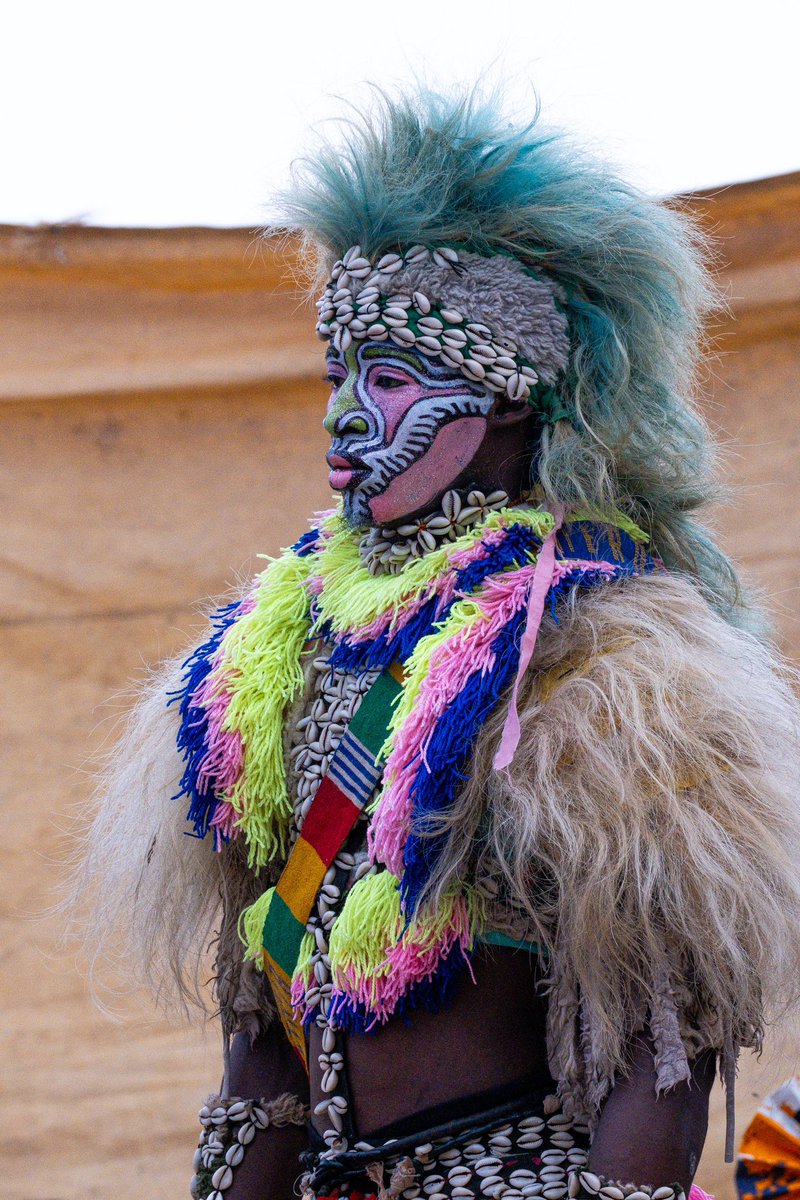 JenVanSickle's tweet photo. The atmosphere at #FauxLyon is a masterclass in over stimulation. The beating of drums, brightly colored costumes full of texture, and chants sung at full volume into an aggressive sound system.🎤🌈#senegal #travel #solofemaletravel #africa https://t.co/dWIevSquip