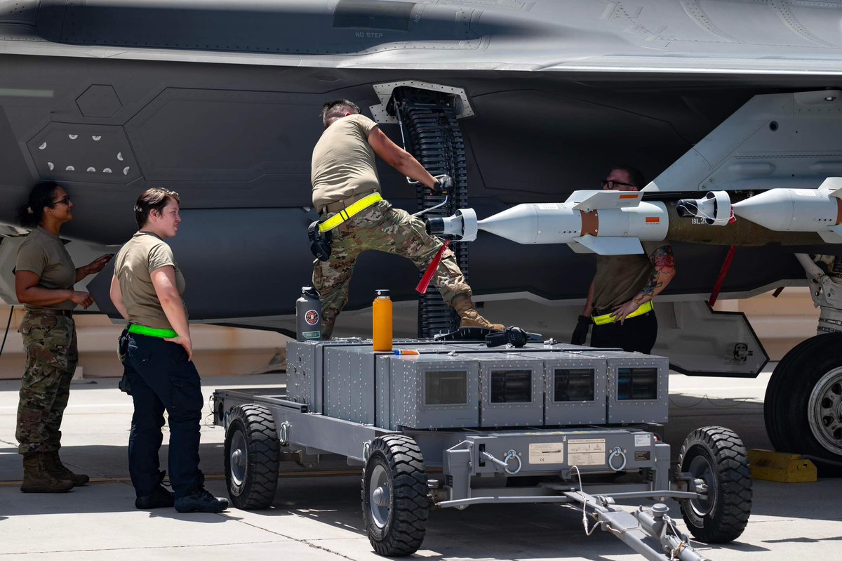 EngineeringElev's tweet image. Weapons load crew members assigned to the 57th Aircraft Maintenance Squadron, load 25mm rounds and GBU-12 Paveway II on an F-35A Lightning II at Nellis Air Force Base, Nevada, Aug. 11, 2023.