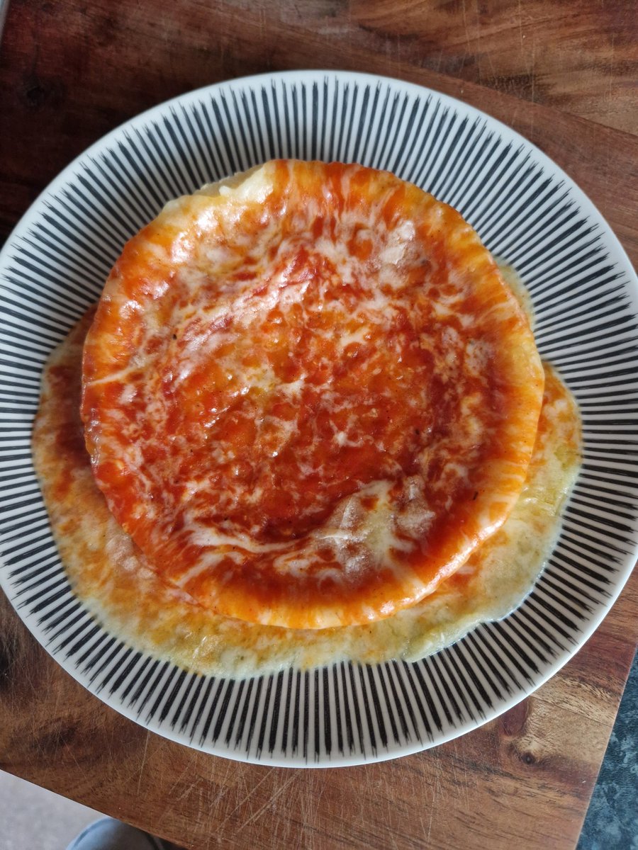 crhcpep's tweet photo. @chicagotown Wtf is this? EVERY time I cook one of your pizzas in the microwave, THIS happens!! I thought I was prepared this time and put it on for 30 seconds less than the instructions say, but no, still nuclear melted pizza. 😭😭 https://t.co/xvtXxbTa6Q