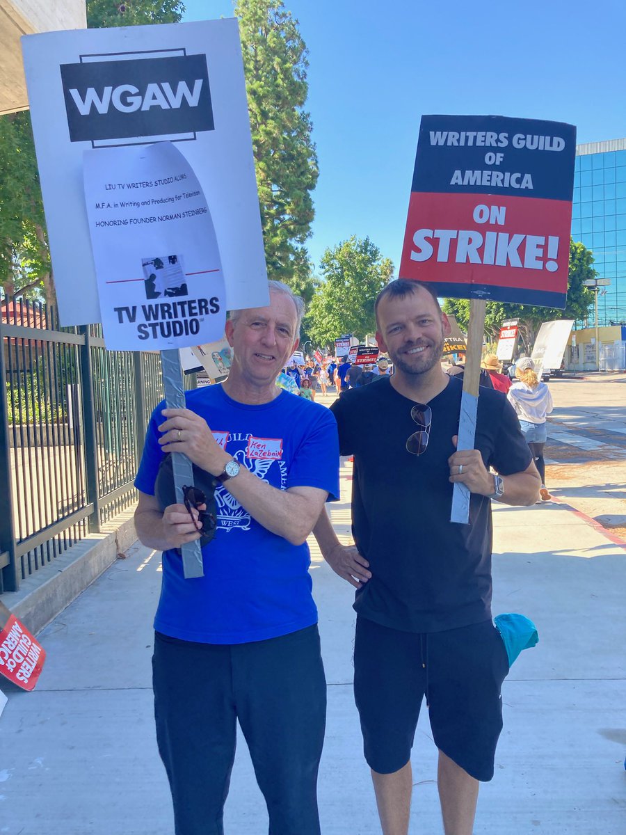 At LIU’s special WGA Picket, MFA Director Kenneth LaZebnik proudly stands with SNL writer Josh Patten!