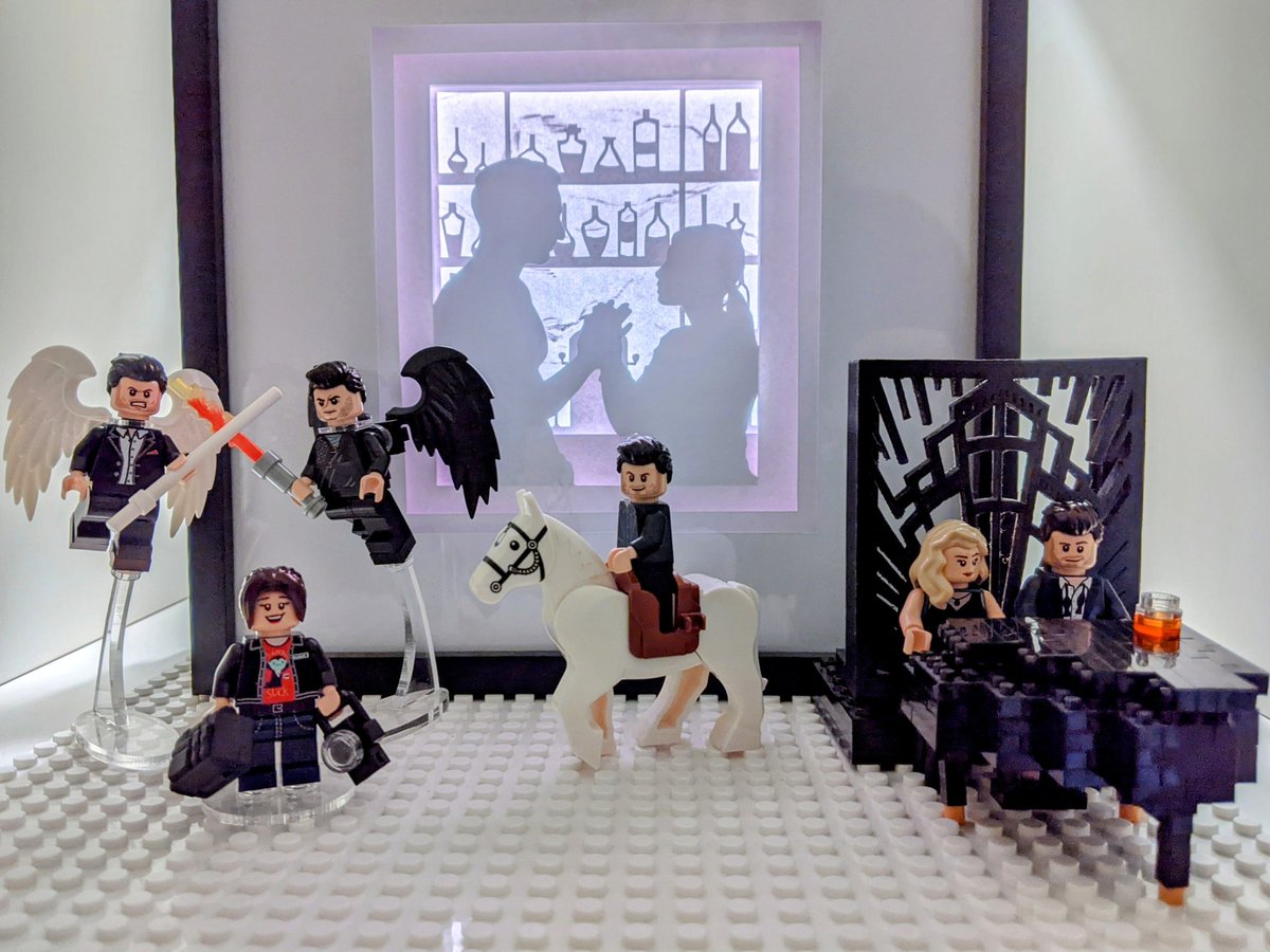 NotOneLineFF's tweet photo. Still trying to convince my husband that having five versions of #LegoLucifer on display is fine because they all have different faces.

...I don't think it's working 😆

(Lightbox by @Keepinmesane, piano stand by @kaykat666) https://t.co/iUlO15F89N