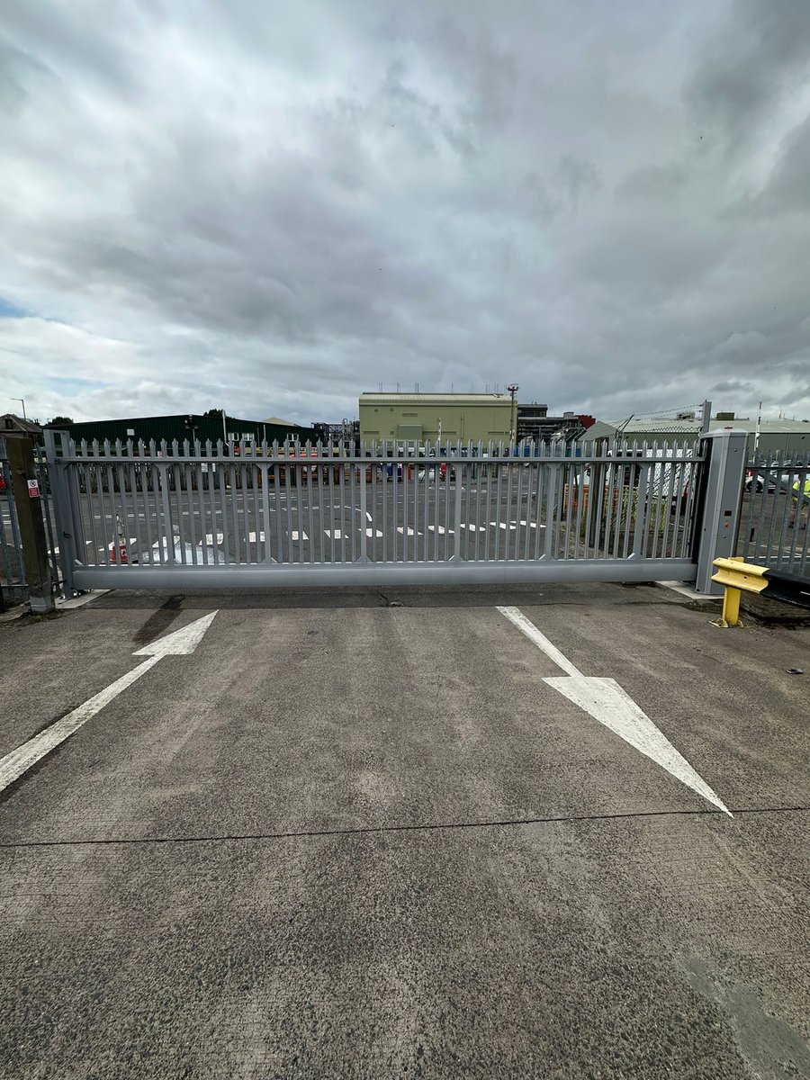 Transport company Falkirk, Scotland,, aluminium cantilever sliding gate supplied by @ParkingFacilit1, concrete bases prepared by our engineers, gate fitted to @DHFOnline code of practice, fence altered to suit the new gate position,, access control using @intratone transmitters