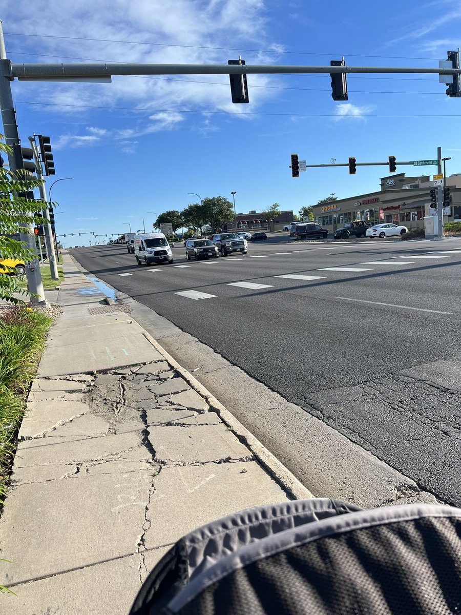 JeanineDeeb's tweet photo. @NewsEnglewoodCO when can you come fix and trim this area of concrete so we can safely walk to school without almost falling in the busy street and getting slapped in the face with bushes? https://t.co/s4fL1RnwVq