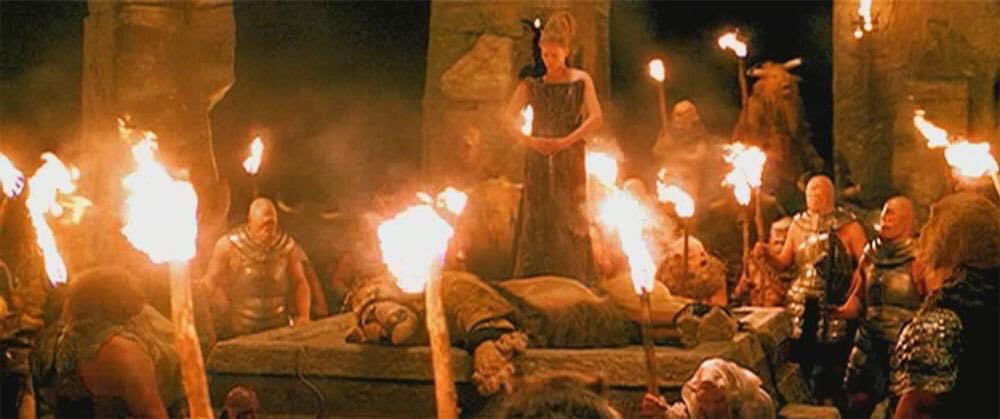 Pero no hizo ni un solo ruido, ni siquiera cuando los enemigos, con terrible violencia, tiraron de las cuerdas en tal forma que estas penetraron su carne. Por último, comenzaron a arrastrarlo hacia la Mesa de Piedra. 

―Las Crónicas de Narnia: El León, la Bruja y el Ropero.