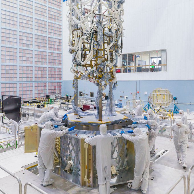 The Nancy Grace Roman Space Telescope’s flight harness is transferred from the mock-up structure to the spacecraft flight structure. Credits: NASA/Chris Gunn 