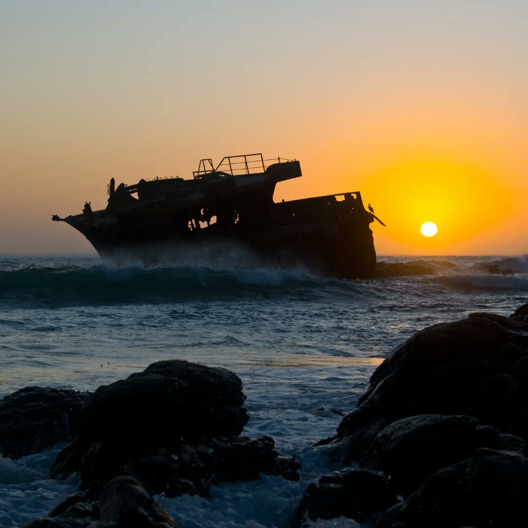 Embrace the golden hour at L'Agulhas, where the Meishu Maru shipwreck tells tales of the ocean's might 🚢. Our deep local knowledge will guide you home, just as sailors trust the lighthouse. Discover the charm of Agulhas living with us! 🏡💼 #RealEstateExpertise #SunsetStories