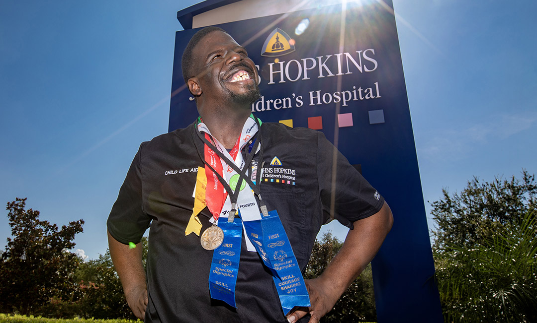 Meet Elijah: A Special Olympic Winner, Child Life Aide and Smile Supplier. He talks about why he enjoys working at Johns Hopkins All Children’s, what a typical day is like, and how he recently competed in the state Special Olympics in Orlando. bit.ly/44gkngw