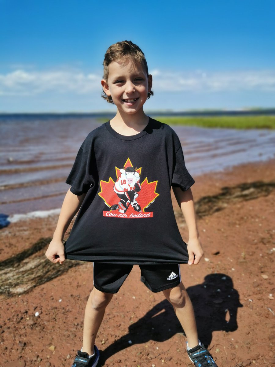 KPMacIntosh's tweet photo. This excited @NHLBlackhawks fan was excited to score a Cow-nor Bedard shirt when in PEI @CowsCreamery https://t.co/6xwJEpMf6I