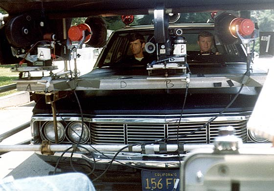 Tuckerpete's tweet image. The #Adam12 pilot was shot Sept 1967. Jack Webb, who directed the Pilot, didn't like the reflections on the windshield. The crew built a shield to place over the top of the car. For driving scenes Sgt “Mac’s” supervisor wagon was used to tow the squad car.