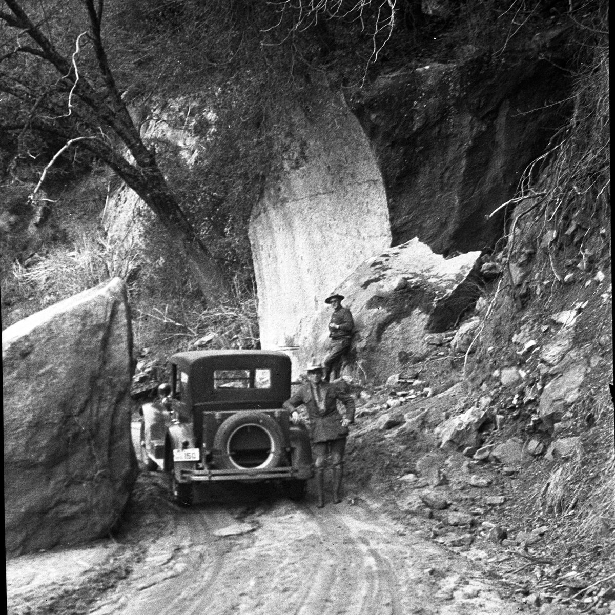 Attention, early birds: The Generals Highway will be closed below Amphitheater Point in Sequoia NP tomorrow from 7am - 8am, in the vicinity of 'One Shot Rock,' for a blasting operation. Here is 'One Shot Rock', the Generals Highway, and engineer N.M. Austin a few years back!