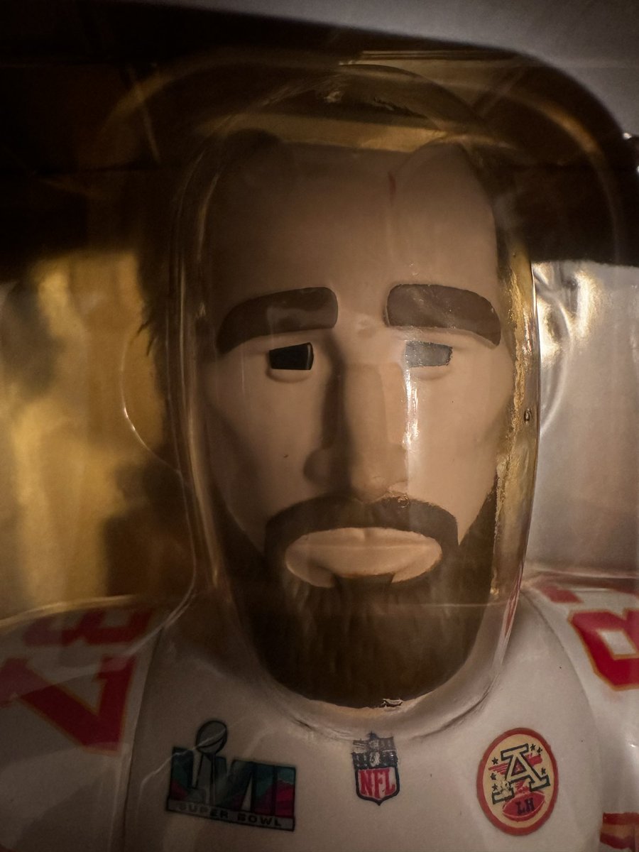 spencer0687's tweet photo. It has arrived! The @funko SuperBowl LVII Champs @Chiefs edition! Question: Is my @tkelce supposed to have a red battle scar on his forehead? @newheightshow @PatrickMahomes #ChiefsKingdom https://t.co/Tan9LAGY36