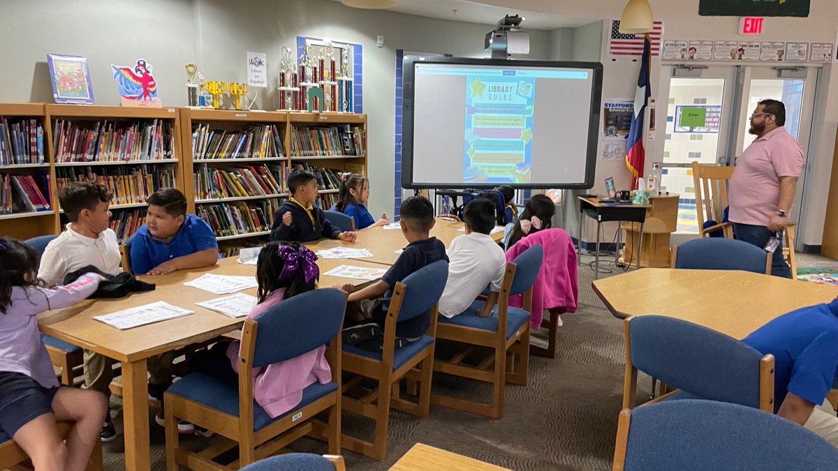 StaffordES_Lib's tweet photo. Stafford 2nd graders learning Library rules with Mr. Acuna. When can we check out books!?! https://t.co/RUA3ettELi