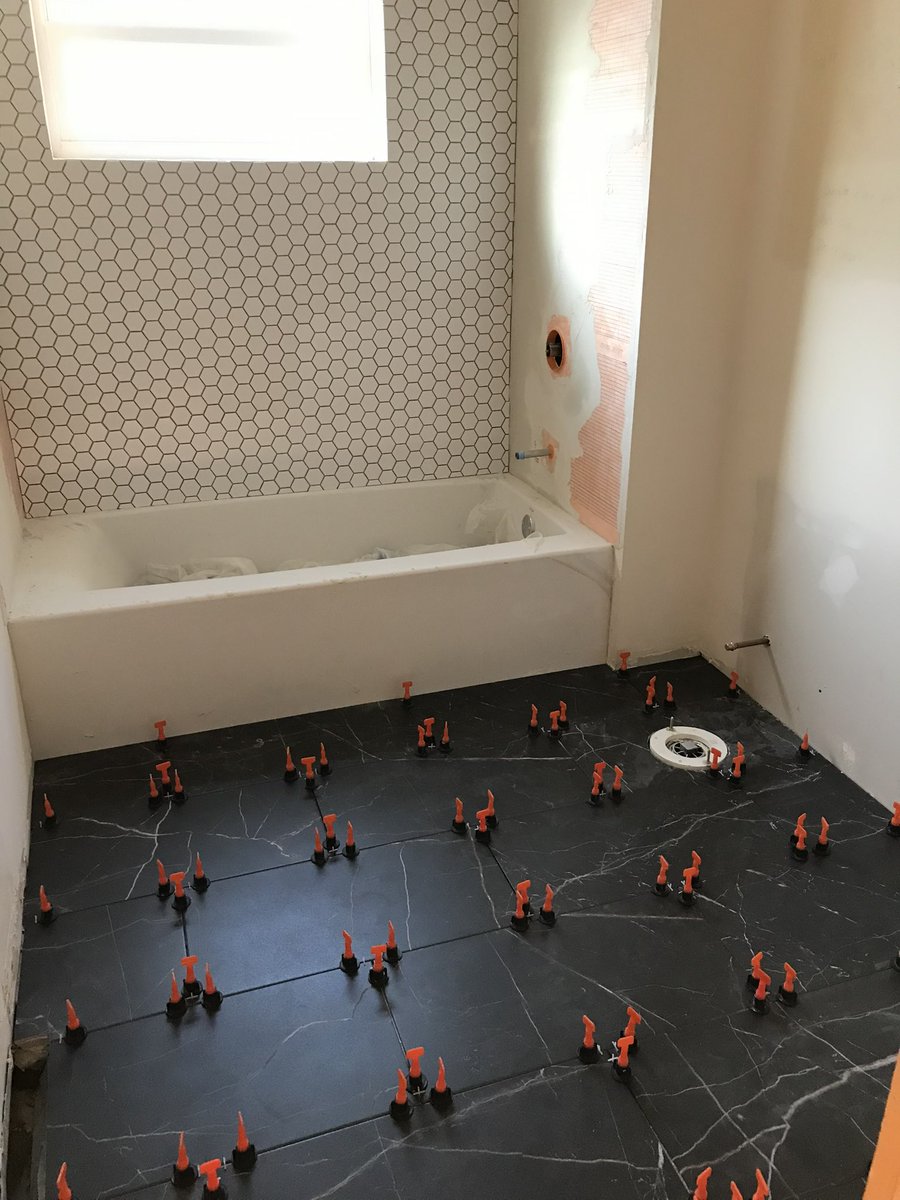 Black floor tiles is the right kind of move