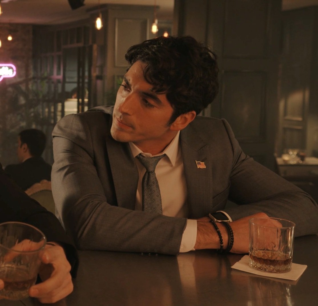 alex claremont-diaz in a bar looking a bit disheveled is a look