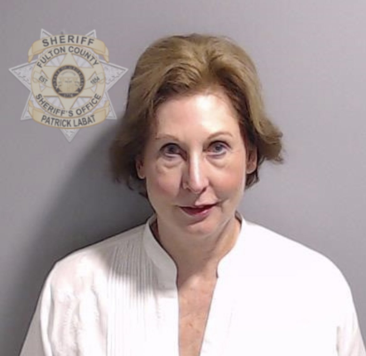 kylegriffin1's tweet photo. Sidney Powell's mugshot — Fulton County Sheriff's Office. https://t.co/AeJL7ei3aJ
