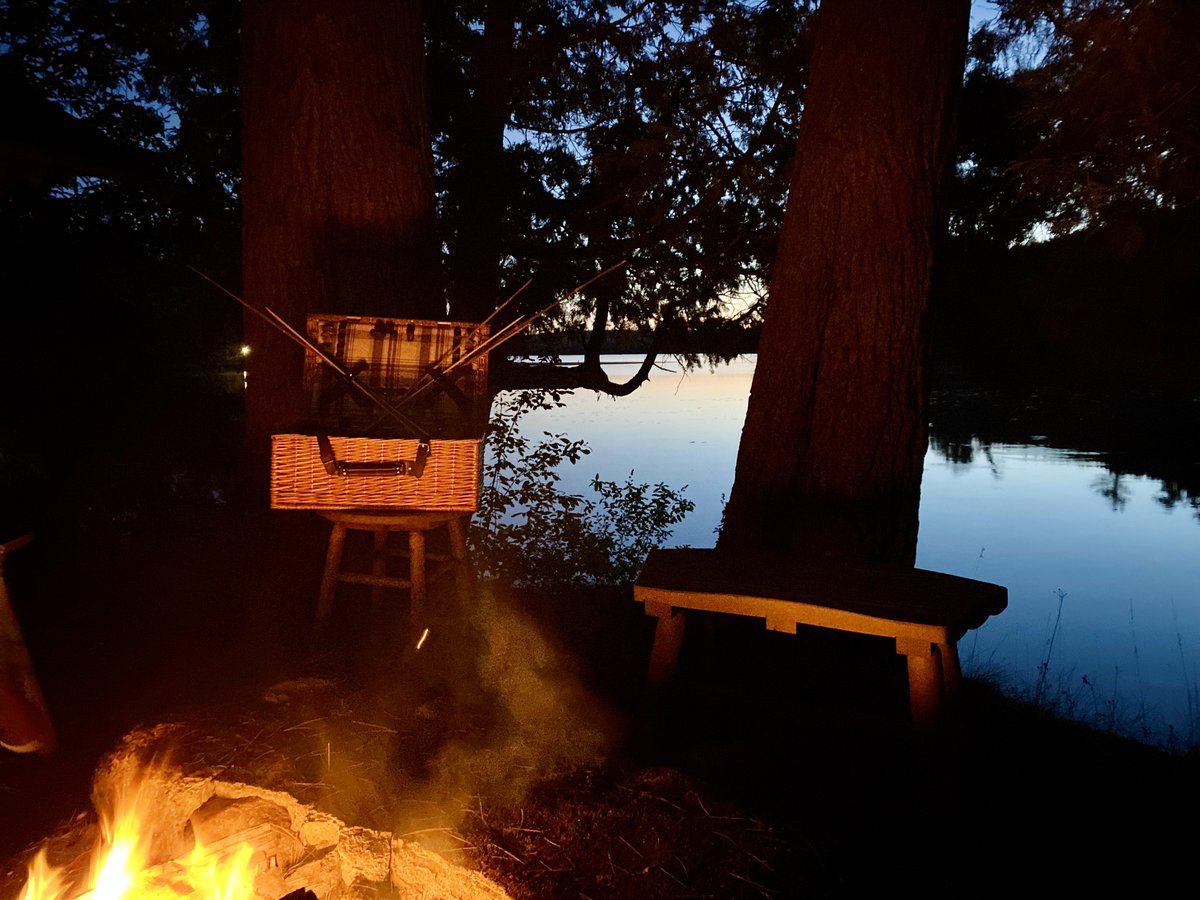 Nothing like sitting on the banks of your serene private #lake by a crackling evening fire with s’mores at the ready. Secluded, peaceful &amp; quintessentially summer in the #adirondacks! #LuxuryTravel #iloveny #jetset #privateretreat #familytravel #summermoments #fireside #smores