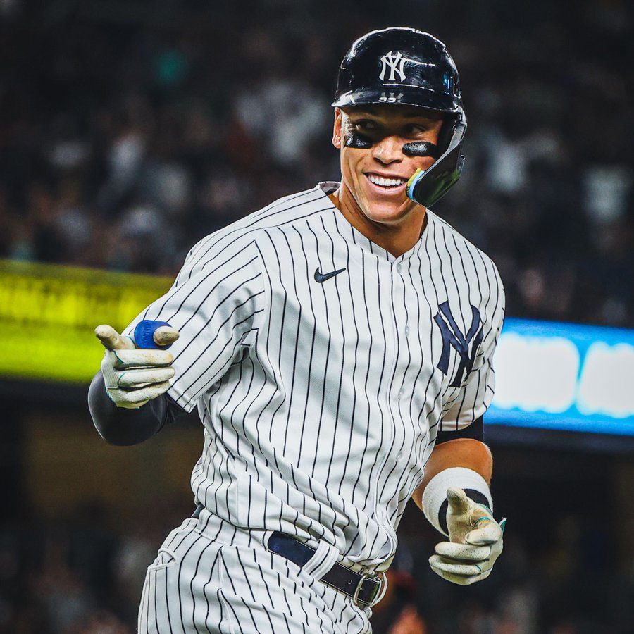 Aaron Judge points to the Yankees dugout after hitting his 3rd homer of the night. 