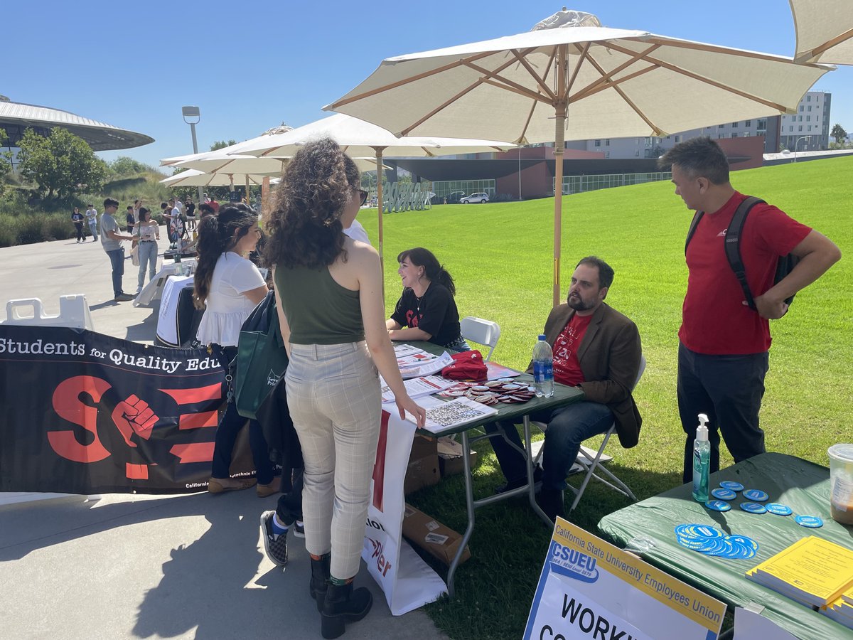 cfa_cpp's tweet image. Chapter leaders tabling at the campus resource fair and passing out informational flyers at the residence halls. Many thanks to our amazing intern!