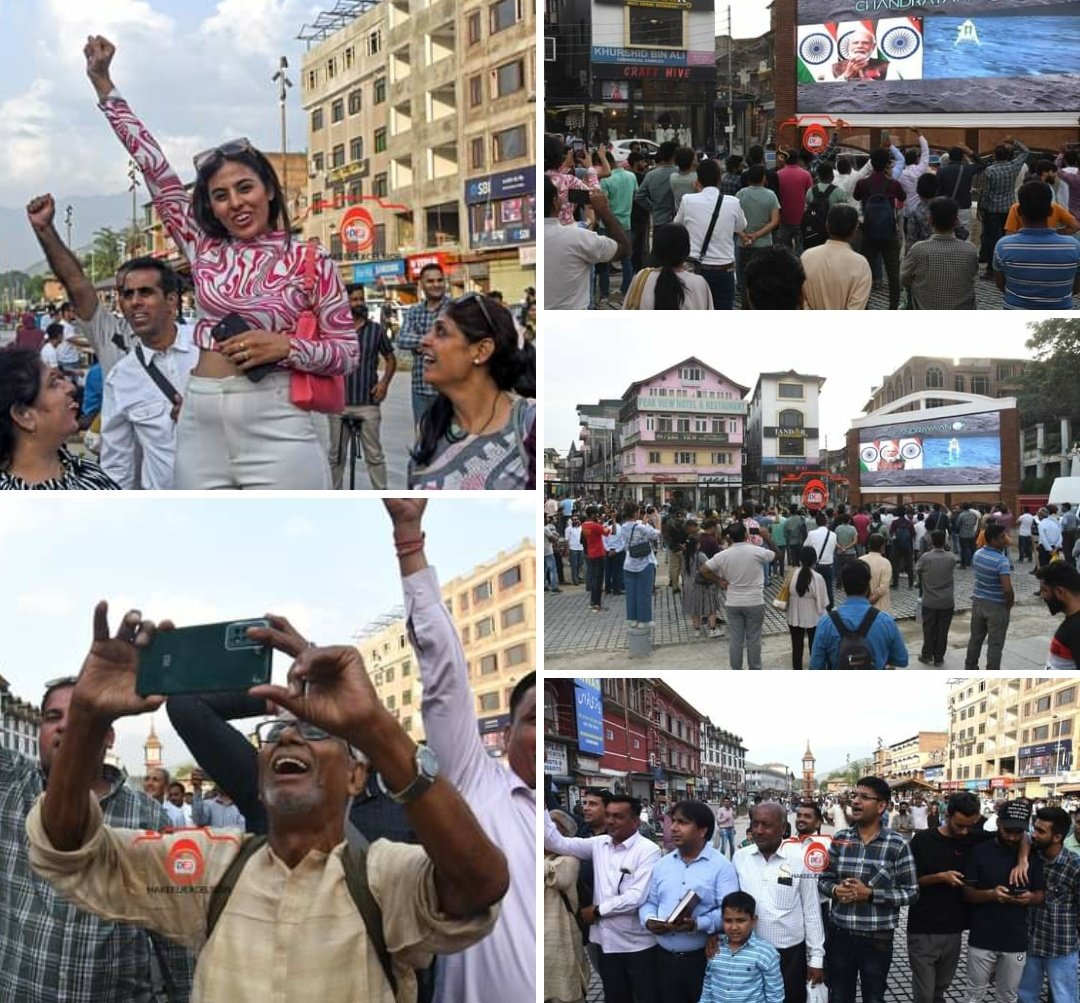 People celebrating the #Chandrayaan-3 successful landing on Moon while watching the live stream on a big screen at Ghanta Ghar in #Srinagar.<a href="/OfficeOfLGJandK/">Office of LG J&K</a>
