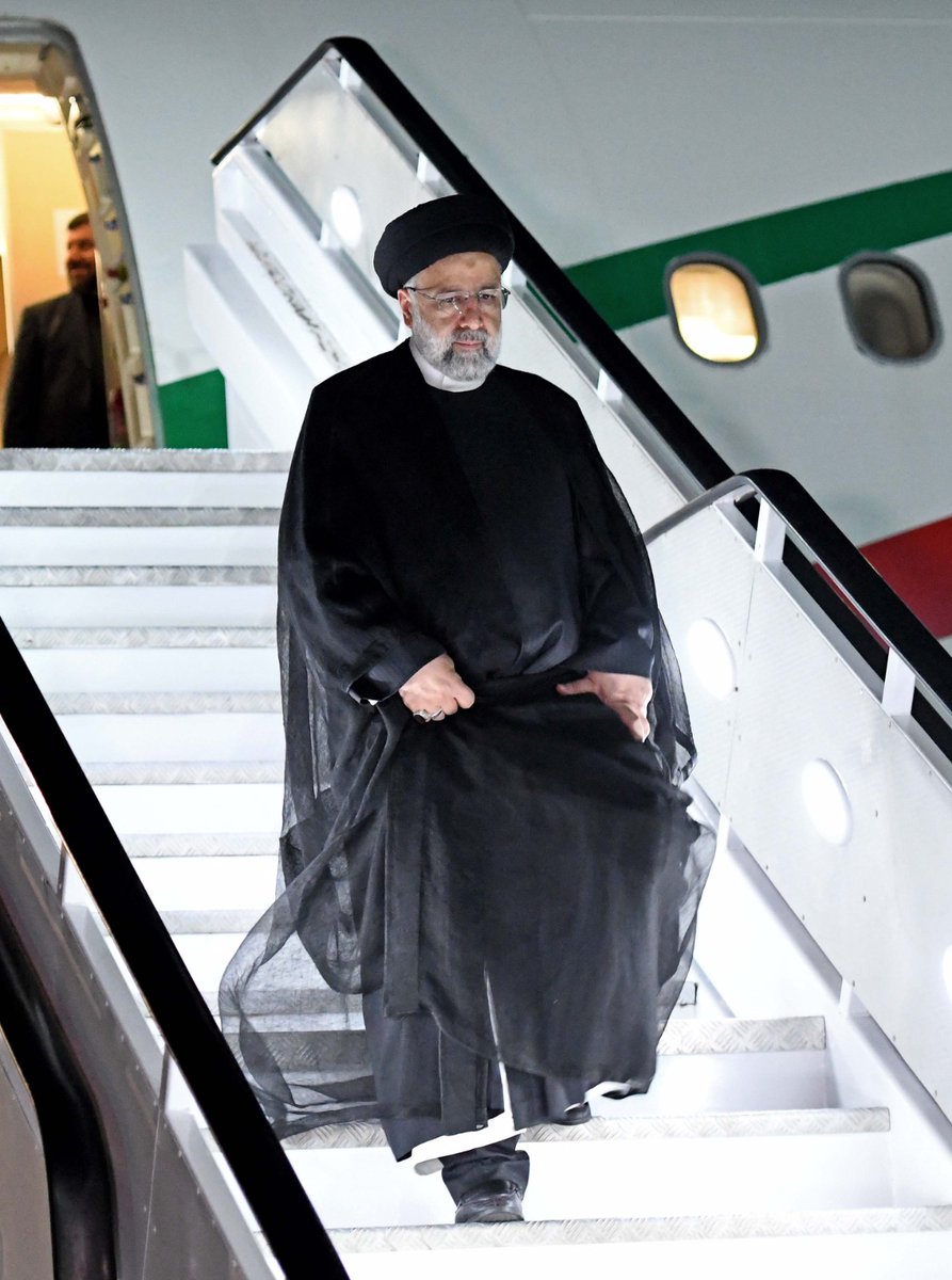 GovernmentZA's tweet photo. #BRICSza | The President of Iran H.E. Ebrahim Raisi arrives at Waterkloof Air Force Base, Pretoria, South Africa. He is received by Minister of Finance  Enoch Godongwana.

#BRICSSummit2023 https://t.co/PJtCTH7SKh