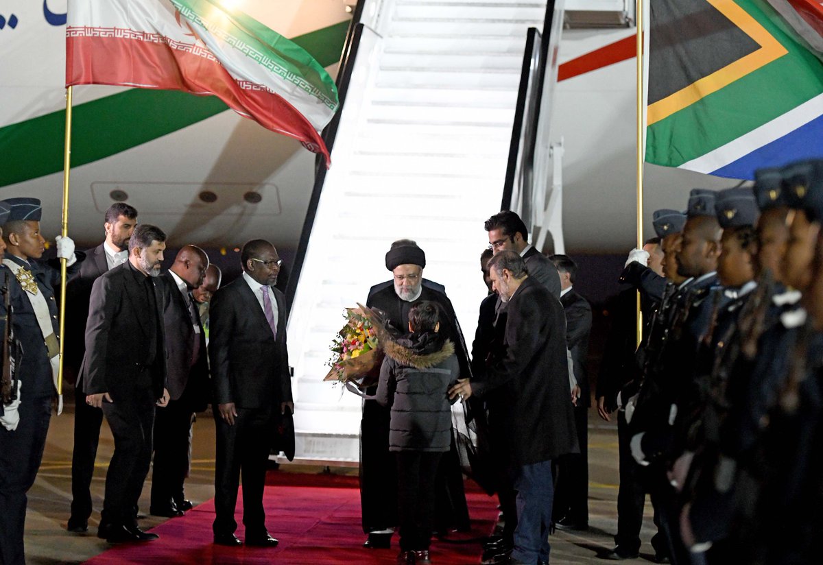 GovernmentZA's tweet photo. #BRICSza | The President of Iran H.E. Ebrahim Raisi arrives at Waterkloof Air Force Base, Pretoria, South Africa. He is received by Minister of Finance  Enoch Godongwana.

#BRICSSummit2023 https://t.co/PJtCTH7SKh