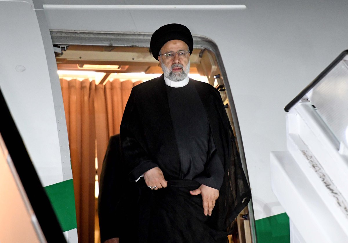 GovernmentZA's tweet photo. #BRICSza | The President of Iran H.E. Ebrahim Raisi arrives at Waterkloof Air Force Base, Pretoria, South Africa. He is received by Minister of Finance  Enoch Godongwana.

#BRICSSummit2023 https://t.co/PJtCTH7SKh