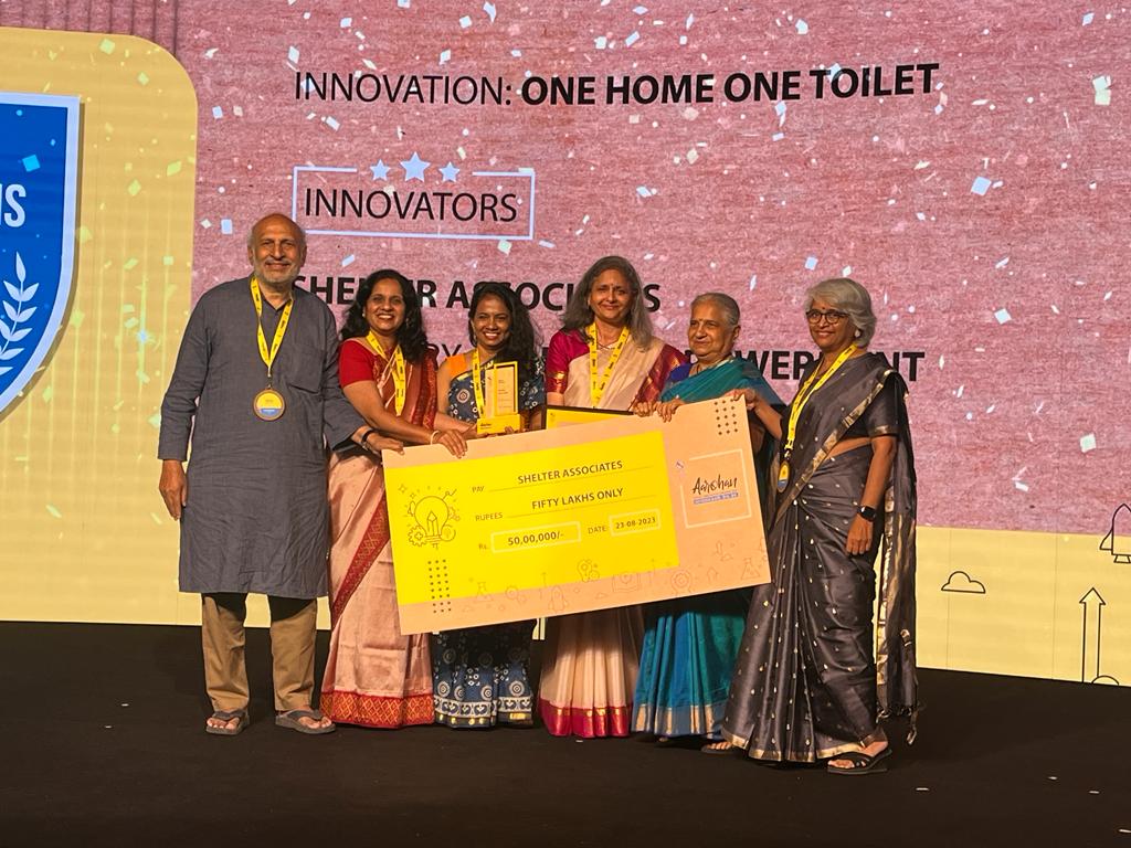ShelterAssts's tweet photo. We are happy to win Aarohan Social Innovation Awards 2023 by @Infy_Foundation  under the Women Empowerment category for our unique data-driven sanitation model, the ‘One Home One Toilet’. Through this, we have facilitated home toilets to 27,000 underserved families. https://t.co/s10ExhE6WM