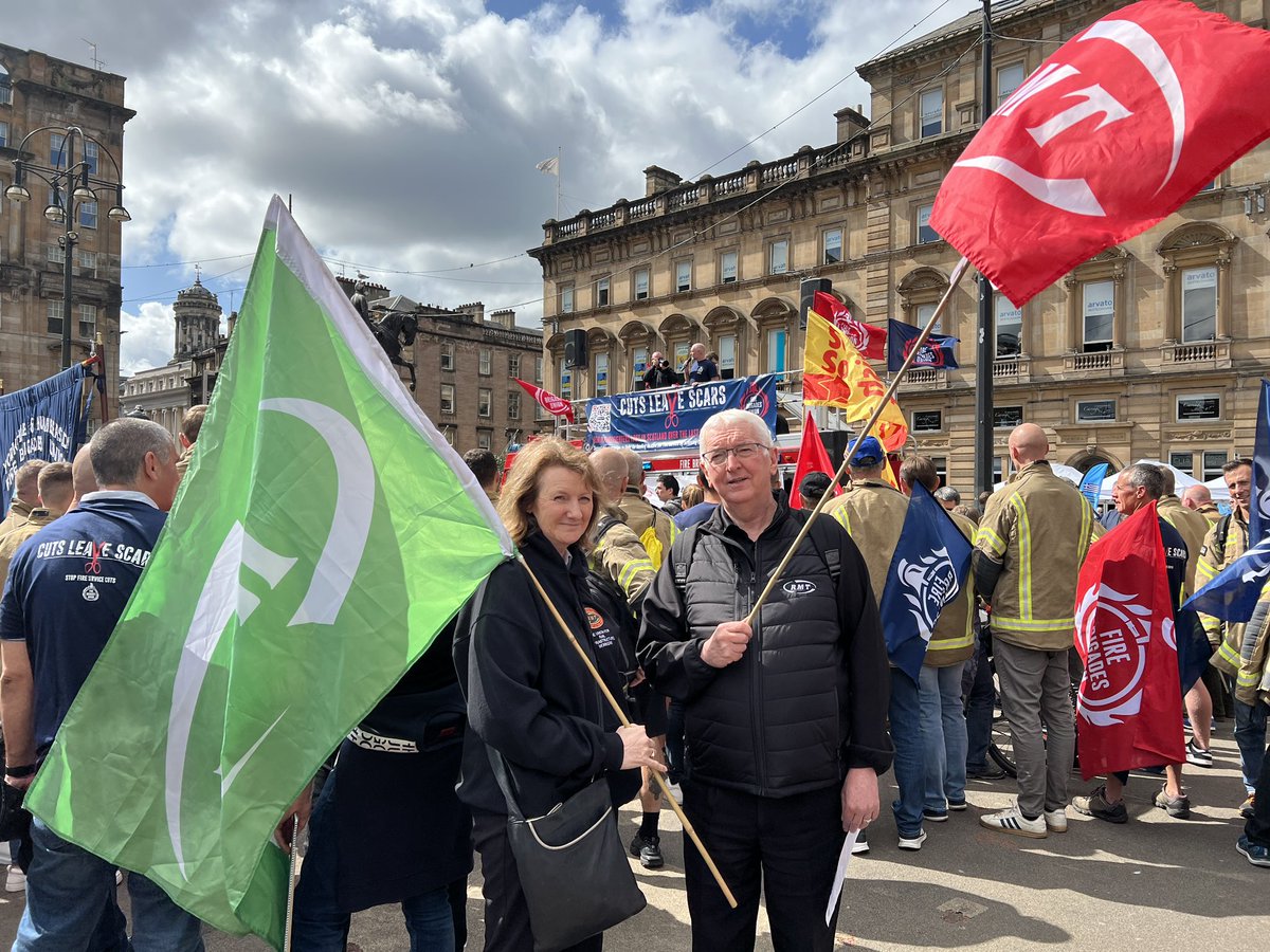 RMT Union Showing solidarity with our Sister Union FBU at demonstration in Glasgow George Square against Government Cuts.