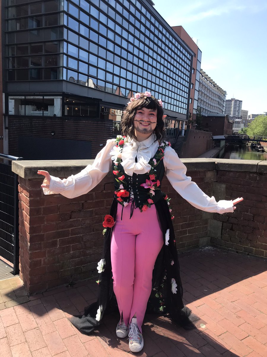 I love using photos from Pride to see my drag progress 💚 (improved face, same goddamn ruffled shirt)