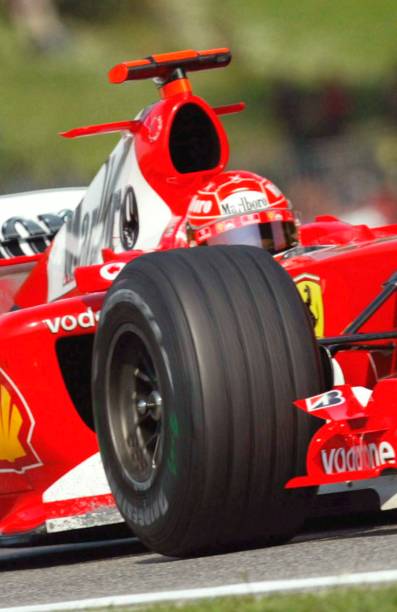 Michael Schumacher, Ferrari, Imola, 2004. Photo: Christian Fischer. #f1