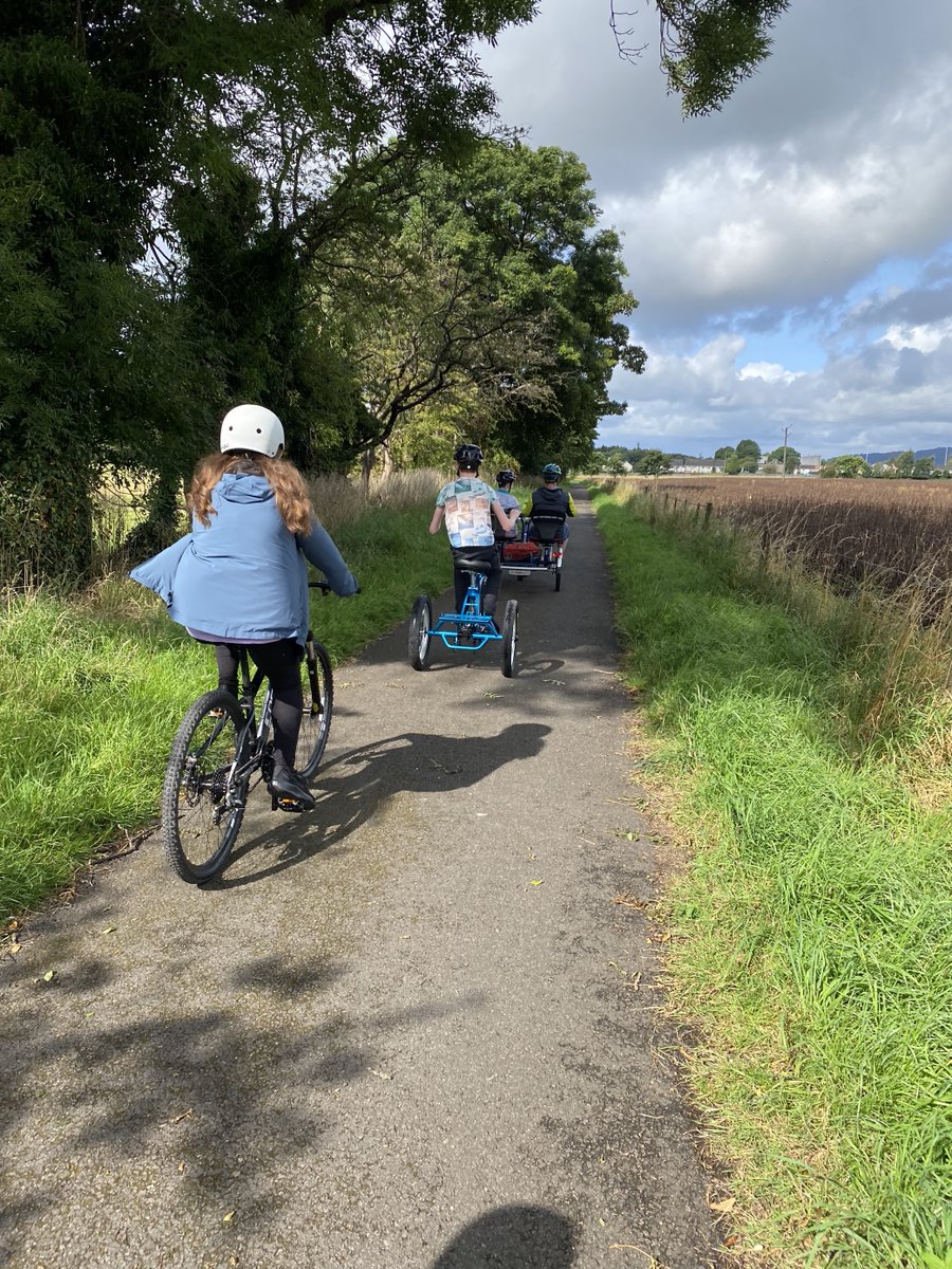 StruanSchool's tweet photo. Jura and Islay enjoyed a joint cycle along to Cambus this morning with Grant from Reckye - a - bike. Our new electric side by side bike is a huge hit with our young people. https://t.co/YWlR3RYG9K
