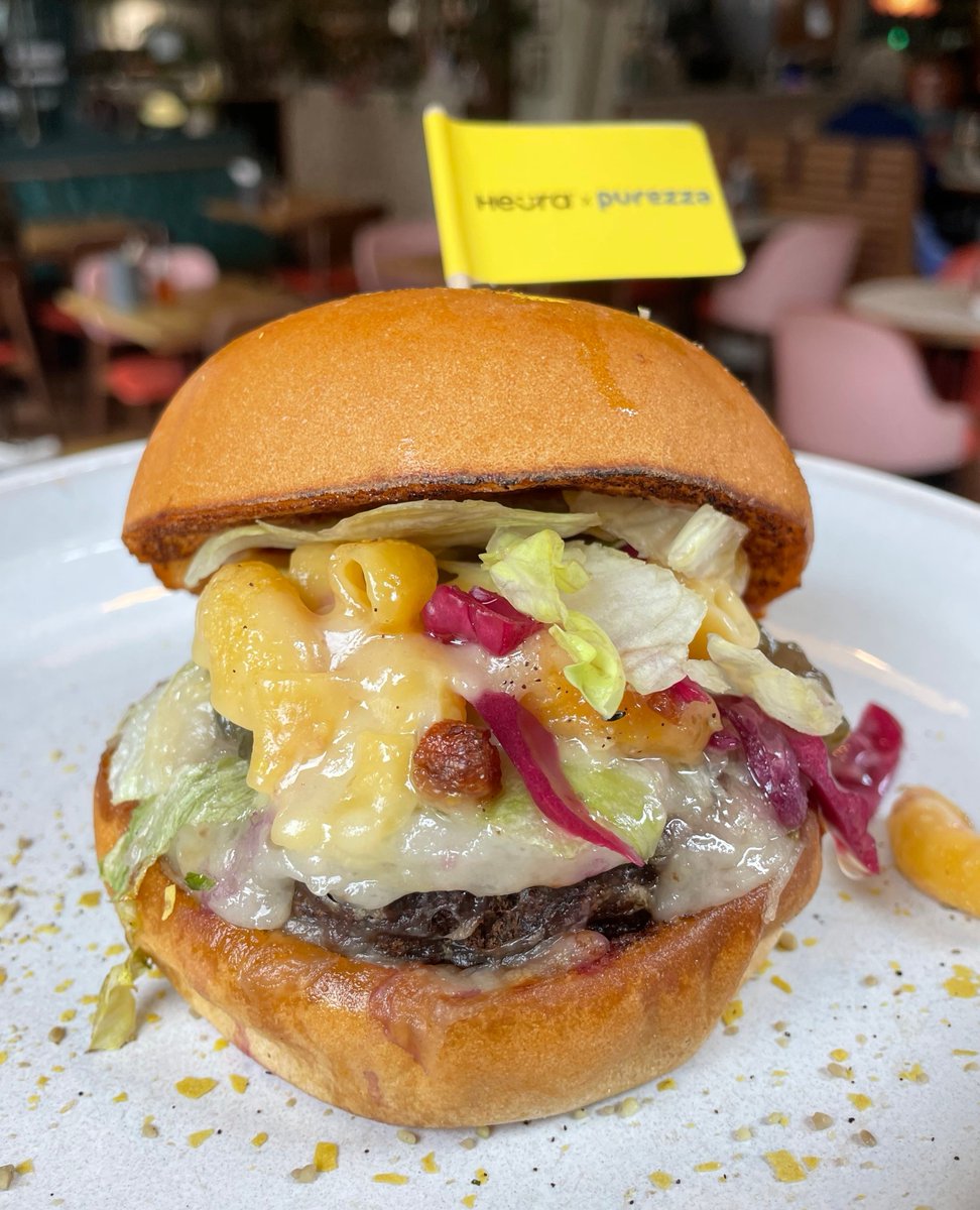 It would be rude not too on #NationalBurgerDay 🍔😋 Perfectly crafted with a juicy @heurafoods patty, our melty Mozzella, topped with garlic mayo and all hugged by a delightful gluten-free brioche bun. 👏 Why not go all out and get a topping of our Mac & Cheese 🤤