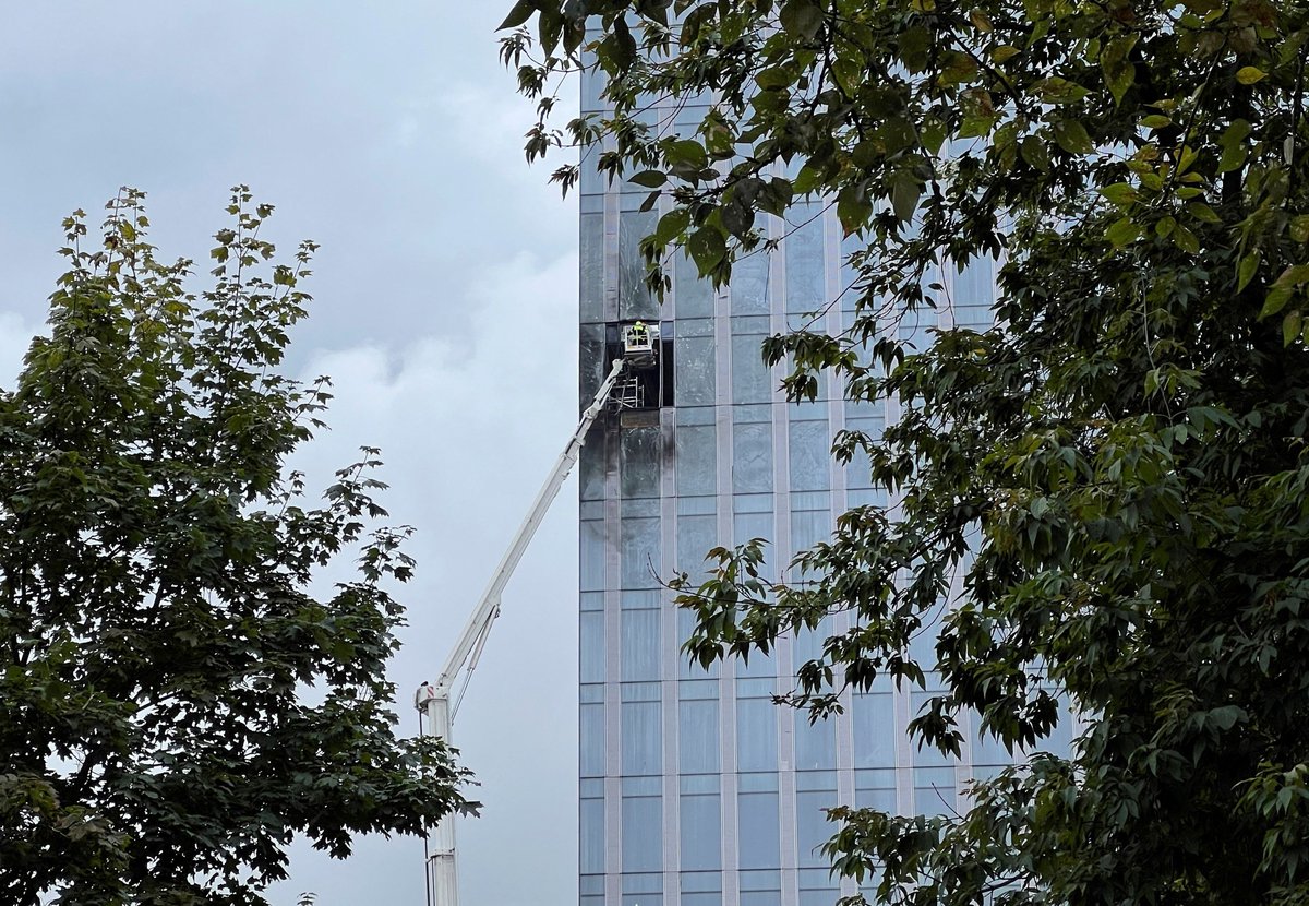 THISDAYLIVE's tweet photo. A view shows the damaged facade of a high-rise building in the Moscow City following an alleged Ukrainian drone attack in Moscow, Russia. #pictureoftheday #ukrainianattack #damage https://t.co/RoZzgh3VLb