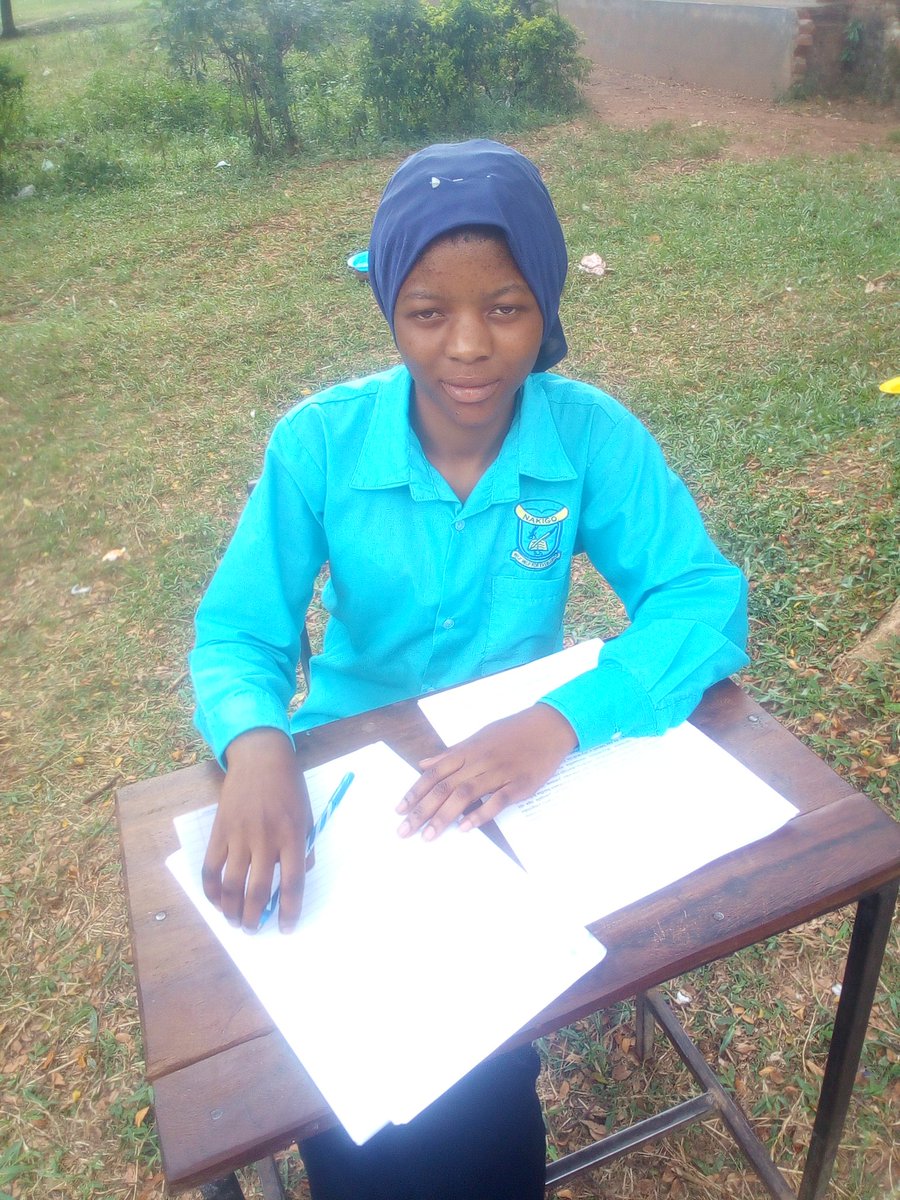 NakigoS's tweet photo. Namugogo Trafine writing her last mock paper this afternoon. #Binancelunchforchildren @BinanceBCF https://t.co/RMDTcfJpDg