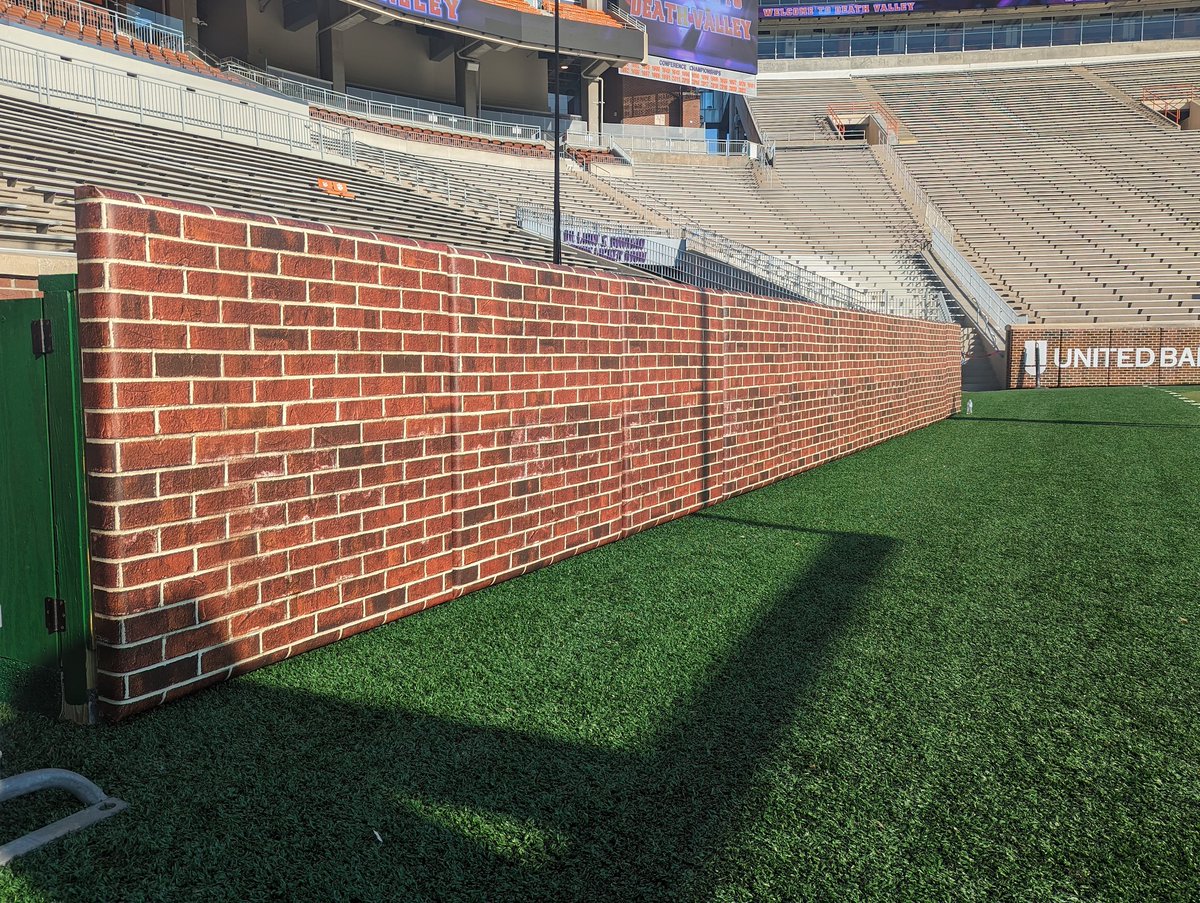 NettingPros's tweet photo. In case you missed it last week... We installed more digital brick wall padding for @ClemsonFB! 

What do you think of the brick look on wall padding? #NettingPros https://t.co/hYRSUWMiVj