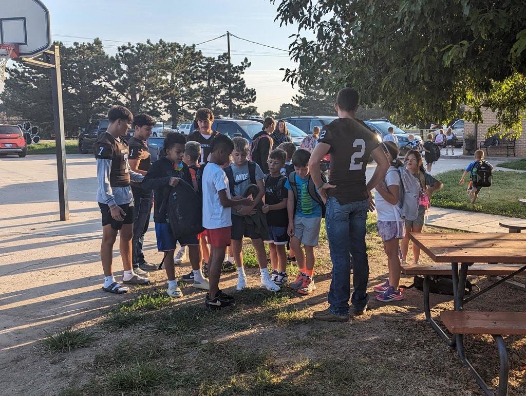 The GCHS football players were at Plymell Elementary School yesterday morning greeting students and giving high fives. The team will participate in a scrimmage at Wichita-Heights tomorrow at 6:30pm.