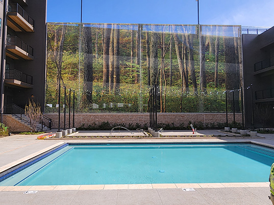 Lightweight fabric screening systems from Enclos Tensile Structures provide architects and developers with a cost-effective solution of transforming the appearance of a building or parking structure. Learn more about the possibilities at hubs.ly/Q01_lQY30