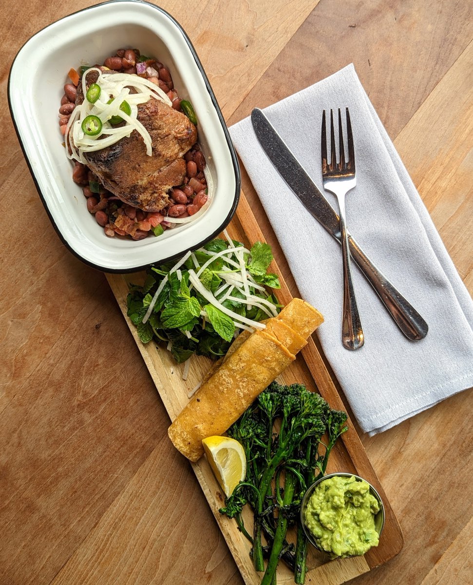 Socalo favorite! PORK CARNITAS NORTEÑAS // broccolini, frijoles charros, guacamole, cilantro radish salad, salsa taquera, pickled onions, organic corn tortillas #socalo #socalosantamonica #porkcarnitas socalo.com