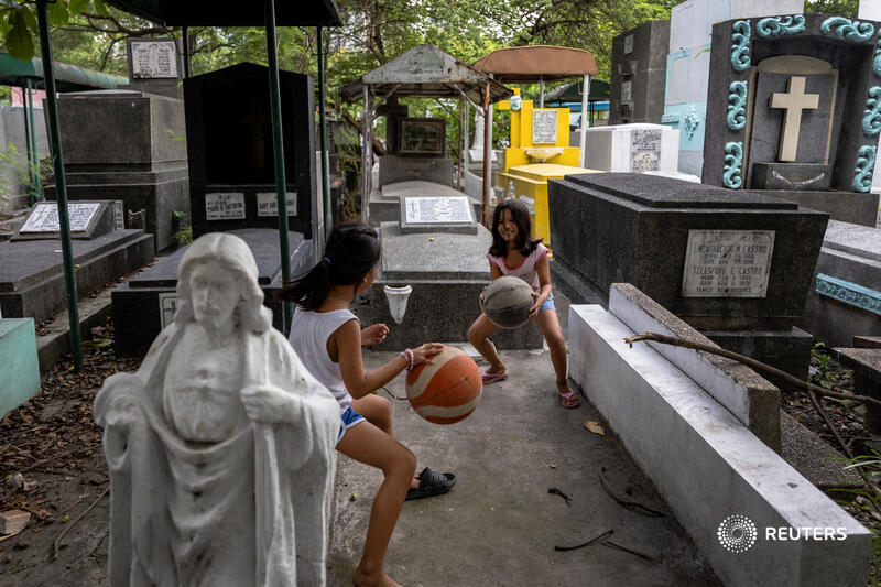 There is a basketball court of sorts set up near most churches, and whether it's in a cemetery or near a sewer, these places of worship are ubiquitous in this majority Catholic nation of 112 million people 4/6