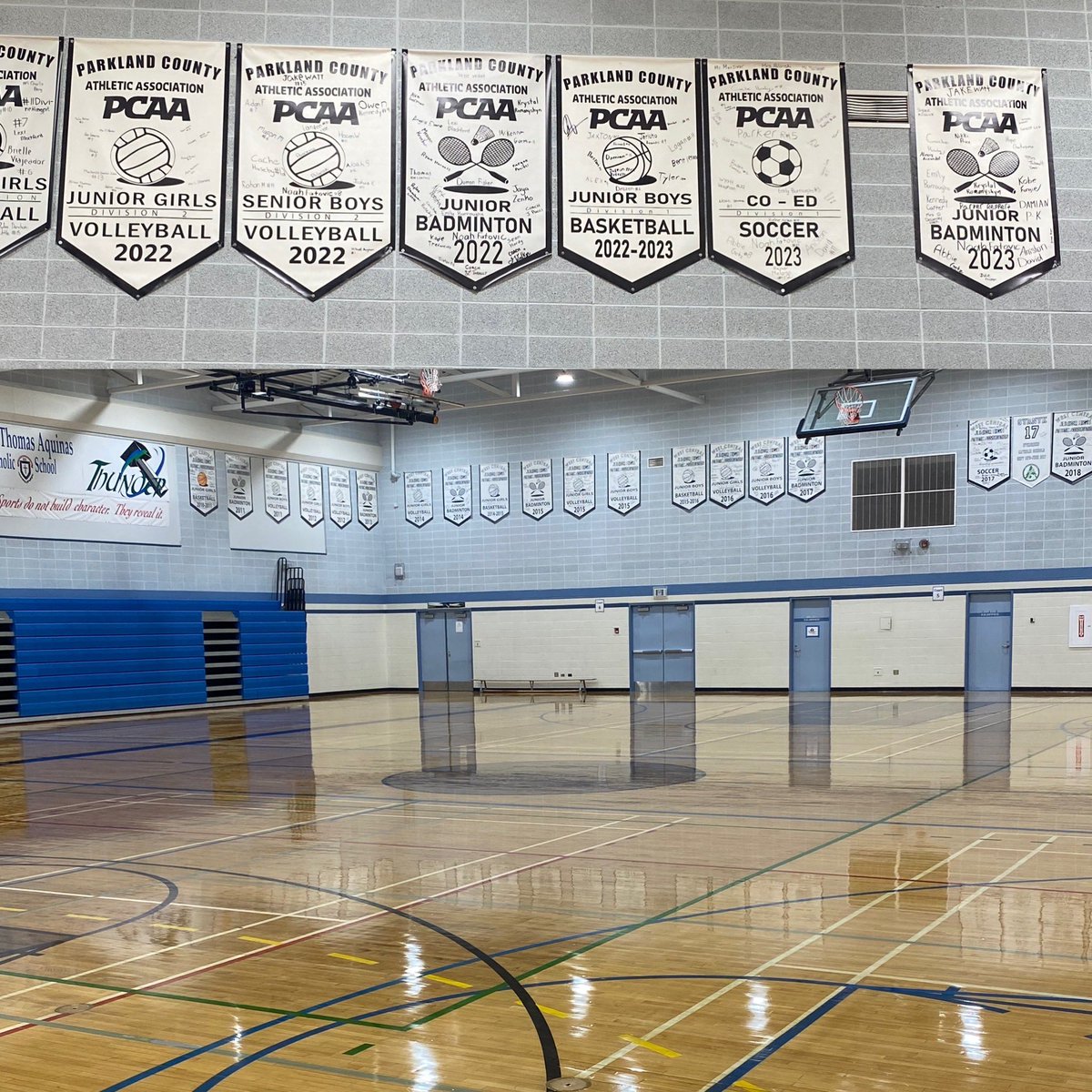 Gym floor sanded, stained and ready for the 2023 school year. Those banners don’t look too shabby either! #feelthethunder⚡️ #welcomebackstudents🤓📚✏️
