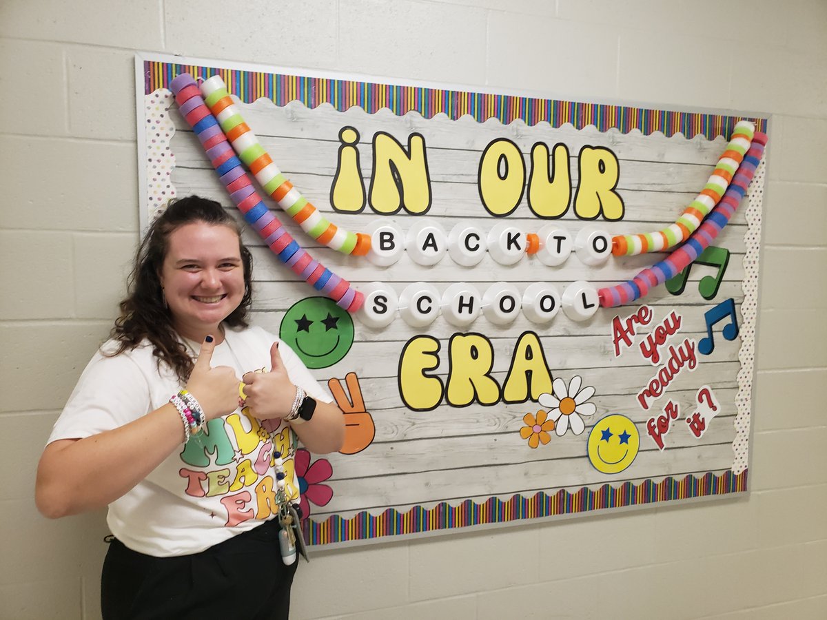 'It's us, hi, we're the NRAC 3-4 staff, it's us'....perfectly positioned in front of Mrs. Franklin's Taylor Swift themed bulletin board. 😍