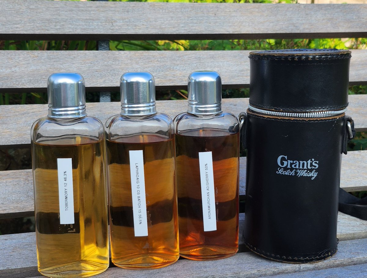 I found this on ebay a while ago,  perfect for taking on a UK holiday, I tell myself it's on the off chance of sharing.. the choices this time 17cl each of tobermory 12, ardnamurchan sherry cask and batch 15 of laphroaig cask strength. What would your 3 companions be?