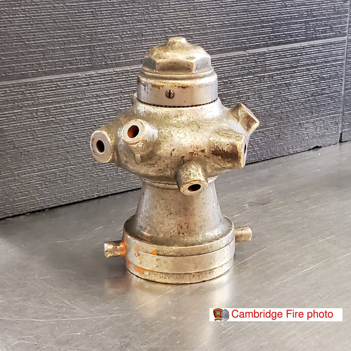 AlanZakrison's tweet photo. In 1907, Capt James Smart of the #CalgaryFireDepartment invented a fire scuttle.
It consisted of an iron aperture and cover, through which a revolving fire nozzle was inserted.
Useful in dealing with basement fires.
This one’s at @charbar_yyc, but others in #YYC have survived. https://t.co/9AcSrUPElO